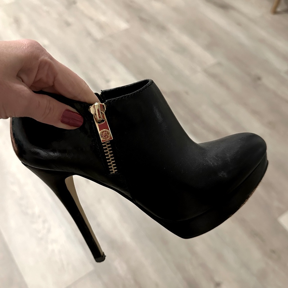 Black booties MK worn only a couple of times. 31/2 inch heels